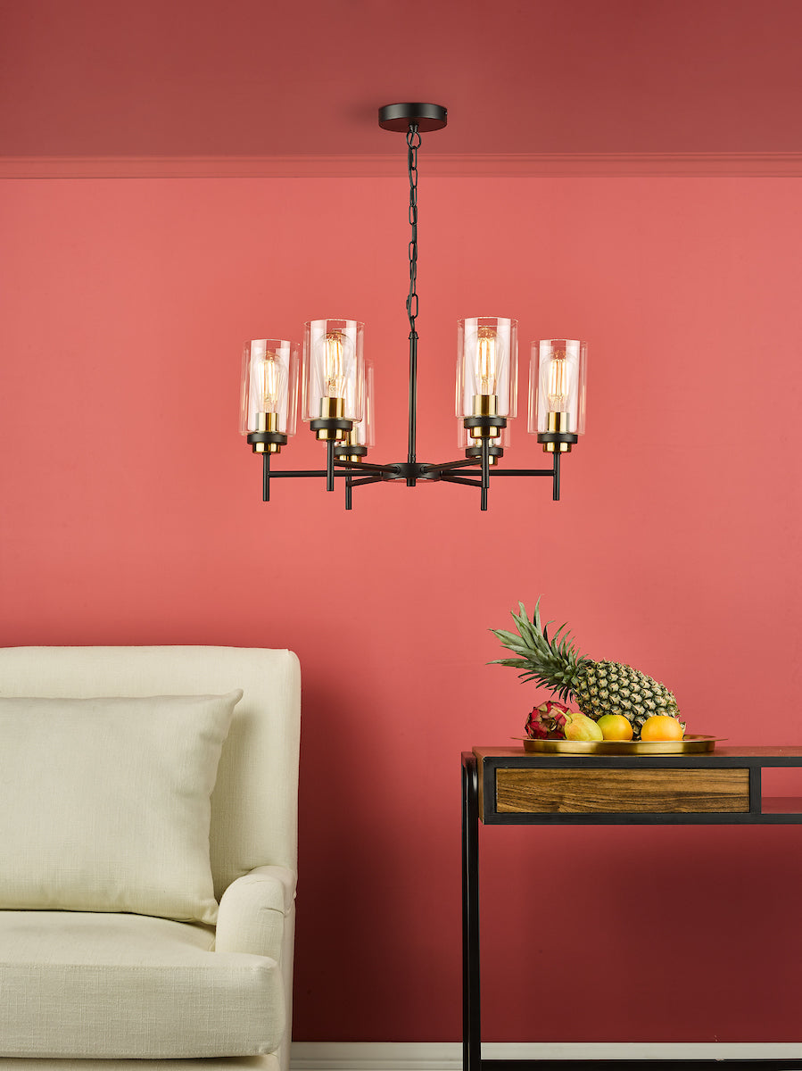 Abel 6 light black and brass pendant shown in a living room setting